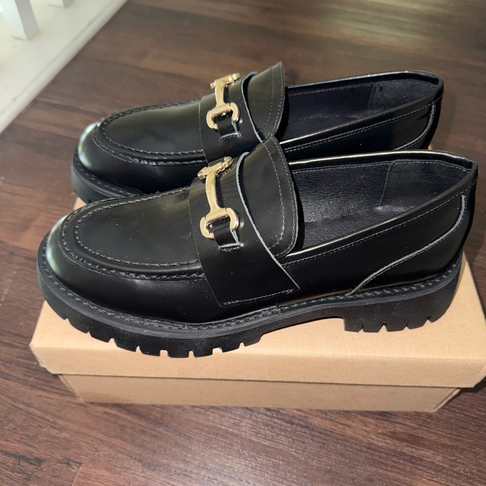 Steve Madden Black and Gold Chunky Lug Sole Loafers